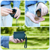Hands holding a dark silicone pouch filled with dog treats outdoors