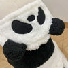 A white and black fleece hooded coat designed in a cute panda face pattern.