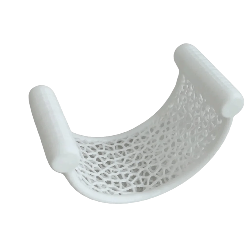 A white 3D printed floating betta hammock designed for aquarium decor.