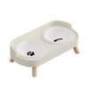 A light beige stainless steel double bowl for dogs and cats with two shallow bowls.