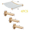Four wall-mounted cat trees with scratching stairs and hammocks in light wood color.