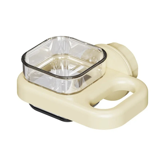 A transparent hanging bird feeder box with a light beige plastic base and handle.