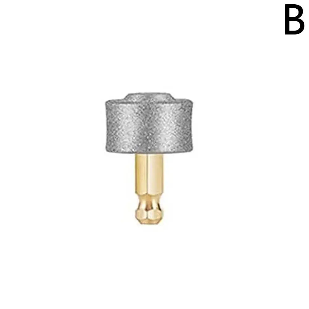 A silver pet nail grinder with a gold-colored tip.