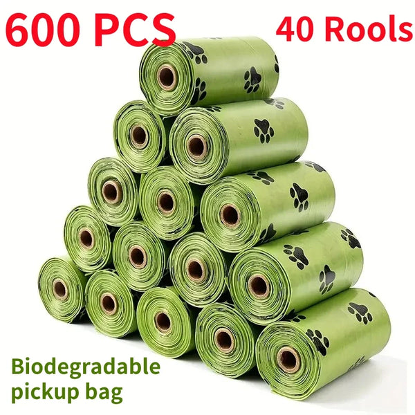 A stack of 40 rolls of biodegradable dog poop bags in a green packaging.