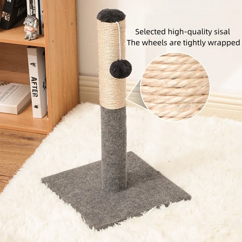 A tall, cylindrical sisal cat scratching post with a fuzzy top and a gray base placed on a white rug.