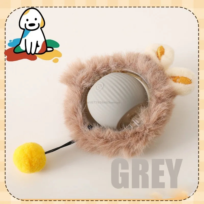 A grey automatic rolling interactive ball for cats with a fluffy exterior and a yellow ball attached.