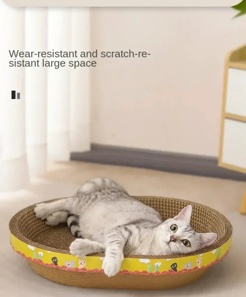 A gray cat is relaxing in a woven, round scratching post designed for cat claws and furniture protection.