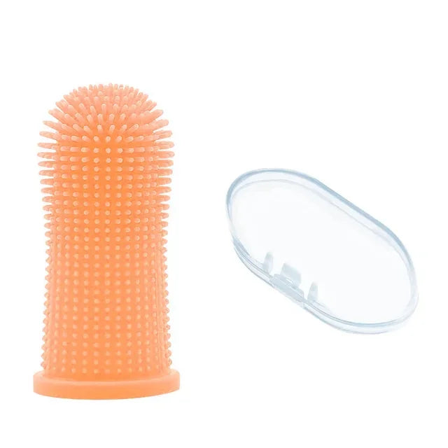 An orange silicone pet toothbrush set for dogs and cats, showing the brush head and a cleaning pad.