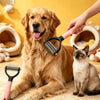 A golden retriever dog is being groomed with a pink stainless steel pet grooming comb.