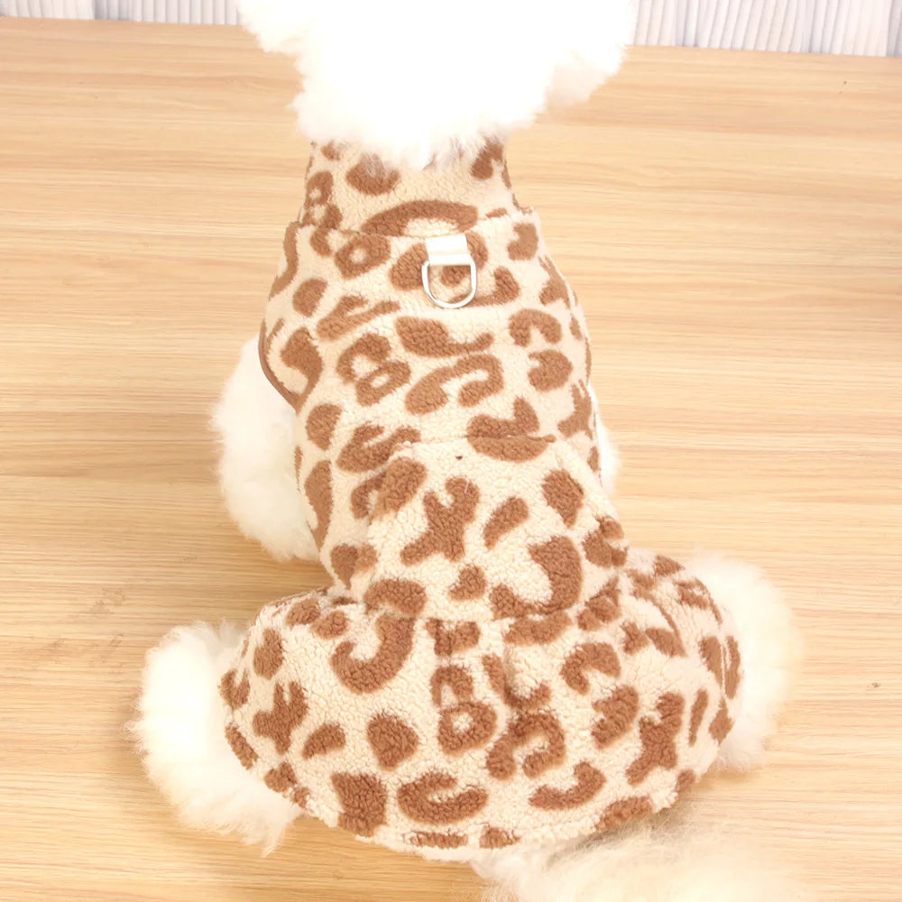 A brown leopard print dog dress with white fluffy trim.