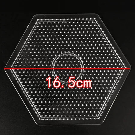 A hexagonal clear plastic tray with small beads and a central ring, marked with a 16.5cm dimension.