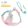 Pink striped color block dog harness and leash set with a pink collar visible