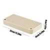 A rectangular beige cat litter box ramp step with a grid texture and filter tray.