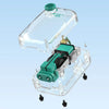 Clear plastic aquarium air pump with a green top and an adjustable flow mechanism.