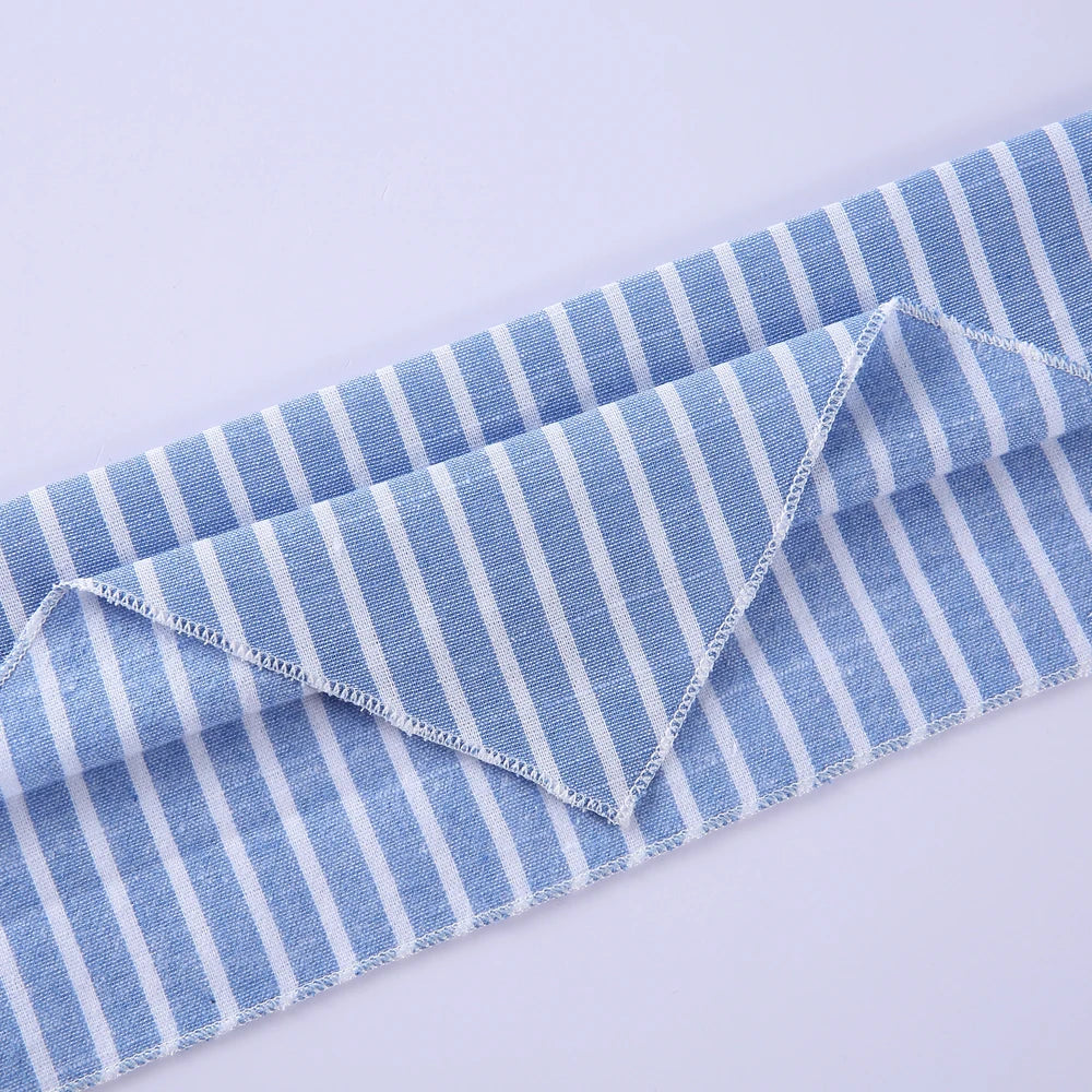 Blue and white striped cotton dog bandana folded and laid flat