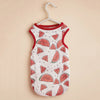 A white sleeveless vest patterned with pink watermelon slices and red trim, displayed on a hanger.