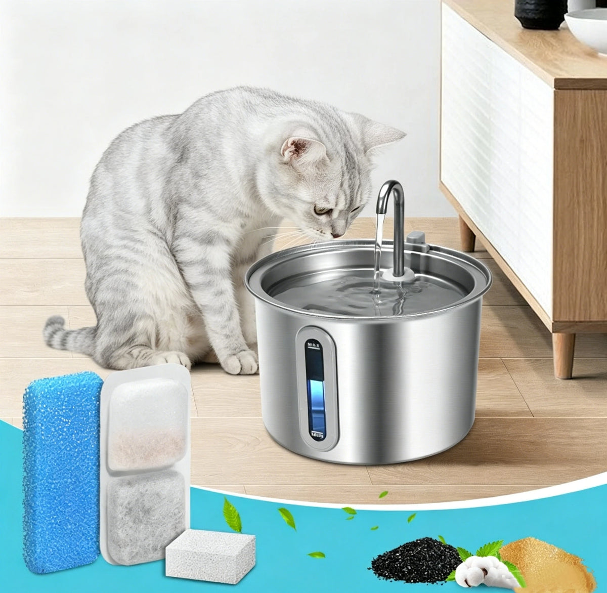 A silver cat water fountain with running water, surrounded by replacement filters and sponges.