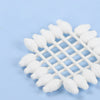 A white foam product featuring multiple cotton swabs arranged in a star pattern on a light blue background.