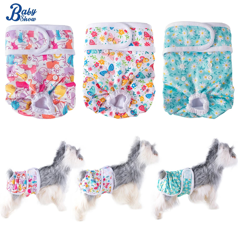 Reusable female dog diapers in various floral patterns and colors shown alongside a fluffy dog model.