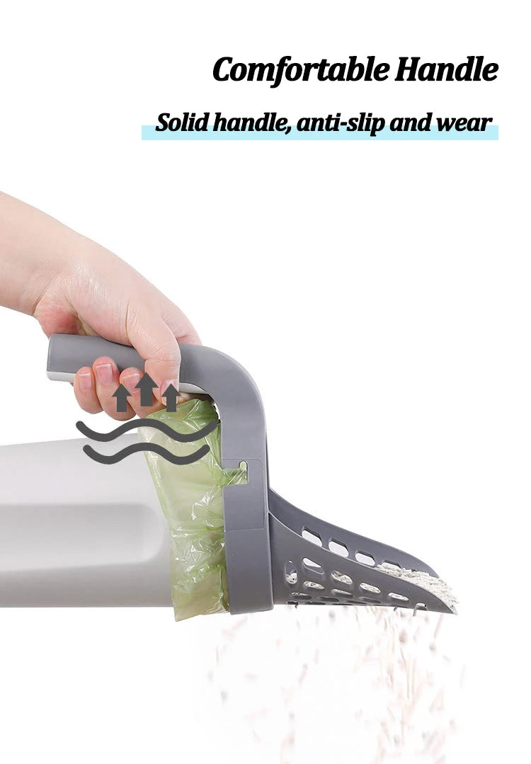 A hand is holding a gray reusable pet litter scoop with a solid, anti-slip handle and a green waste bag.