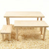 A light wooden hamster climbing platform with a flat surface is shown on a beige carpet.