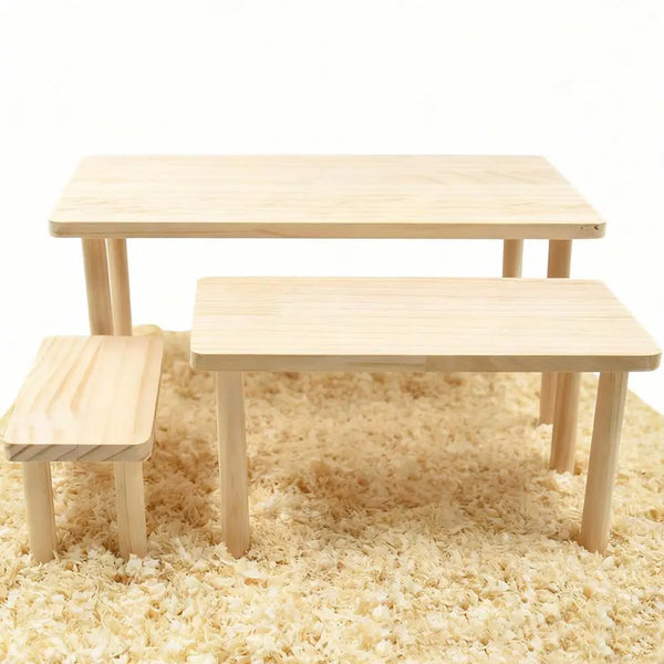 A light wooden hamster climbing platform with a flat surface is shown on a beige carpet.