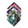 A stack of five camouflage print cotton bandanas in various green, brown, and pink patterns.