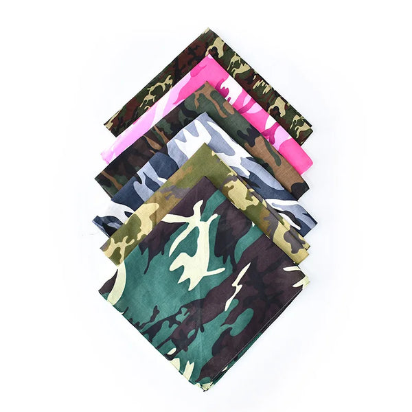 A stack of five camouflage print cotton bandanas in various green, brown, and pink patterns.