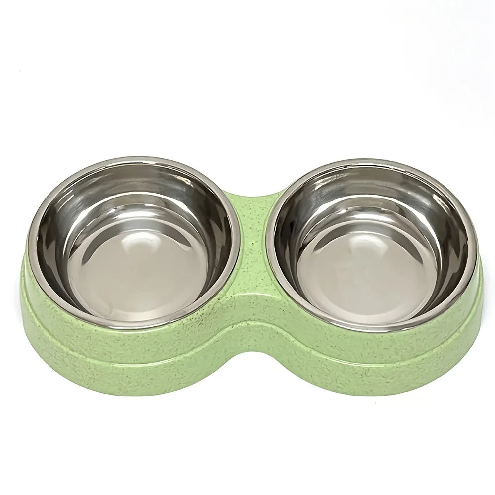 Zwei Edelstahl-Schalen für Hunde und Katzen mit hellgrüner Silikonbasis