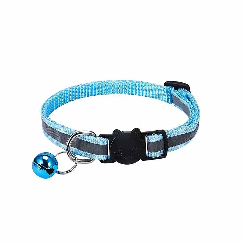 A blue and black reflective cat collar with a breakaway buckle and attached bell.