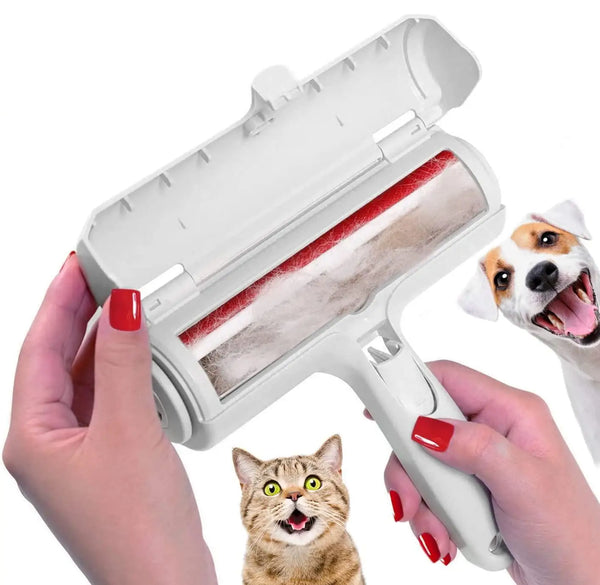 A hand is using a white reusable pet hair remover roller to remove hair from a cat.