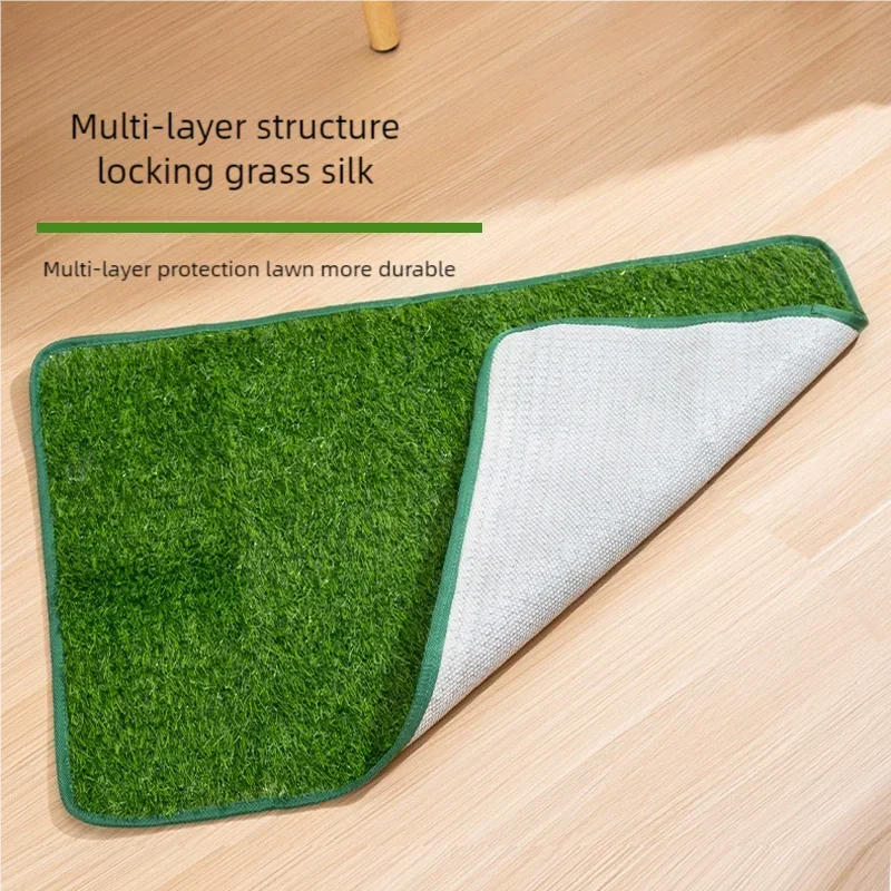 A multi-layer protection lawn grass silk dog potty pad showing green and white layers.