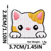 White cat embroidered iron-on patch with yellow accents on a white background