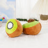A plush toy shaped like an avocado and kiwi fruit, featuring green and brown colors.