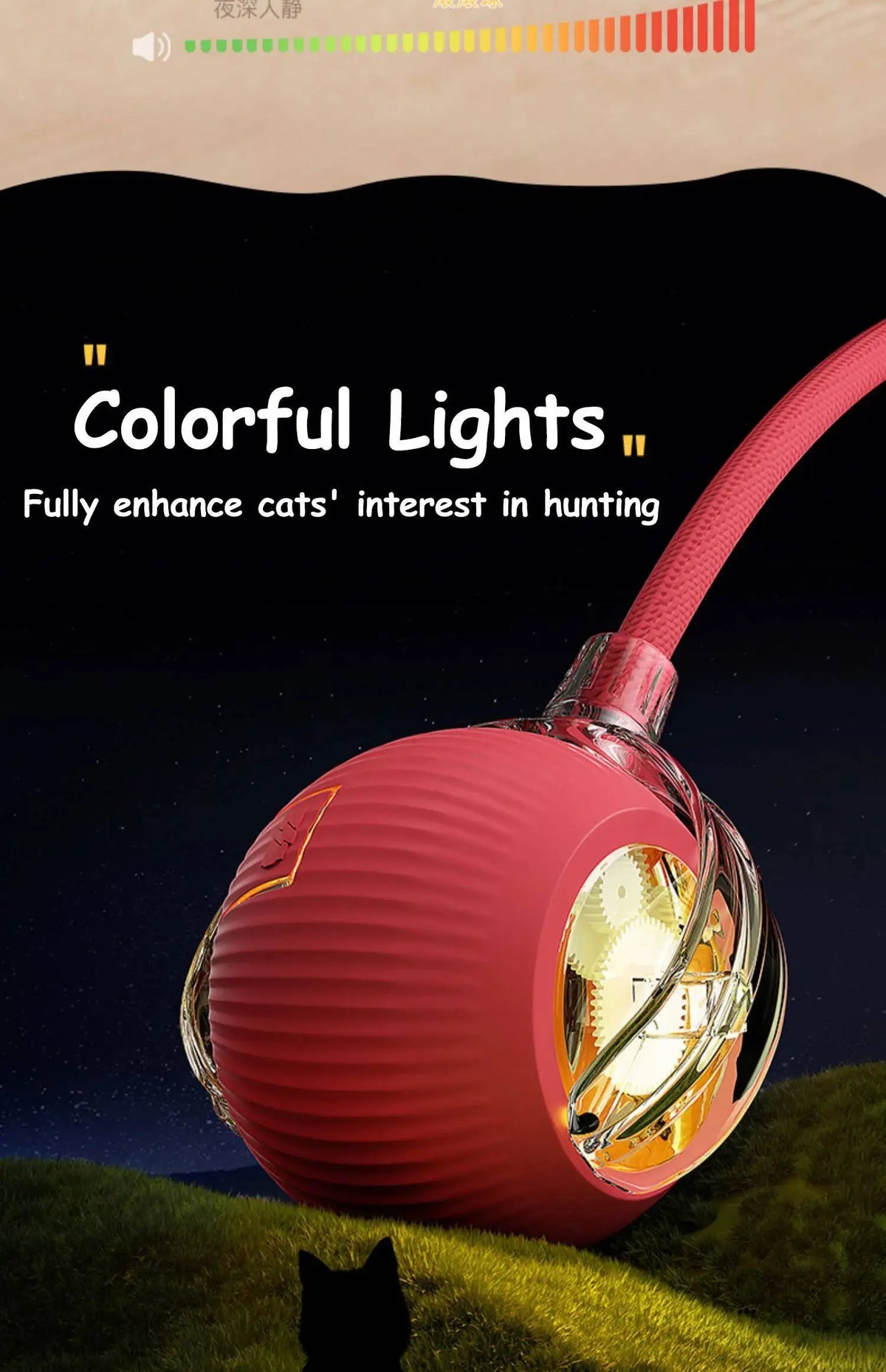 Pinkes, automatisches rollendes Lichtspielzeug für Katzen vor dunklem, grasigem Außenhintergrund.