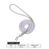 A white reflective nylon traction rope leash with a quick-release clip and sizing options listed.