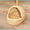A natural straw woven mat with dimensions 15cm, 13cm, and 20cm is shown on a wooden floor.