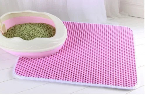 Pink and white double-layer cat litter mat with a green litter tray
