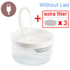 A white pet water fountain jar with a spout, accompanied by three extra filters and a USB power cable.