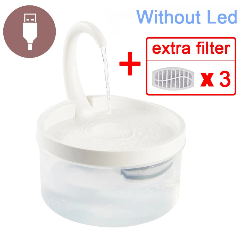 A white pet water fountain jar with a spout, accompanied by three extra filters and a USB power cable.