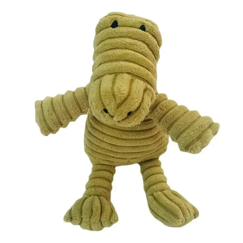 A soft, olive green corduroy squeaky dog toy shaped like an animal.