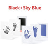 Black and sky blue baby handprint and footprint kits for keepsakes displayed on a white background.