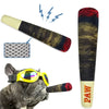 A plush dog chew toy in black and red stripes is shown next to a dog wearing yellow goggles.
