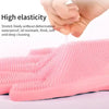 Pink silicone pet grooming gloves with textured silicone bristles shown being used for bathing or hair removal.