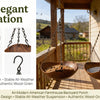 A wooden bird feeder with a bowl suspended by an iron chain, shown in a backyard porch setting.