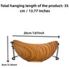 A wooden bird feeder with a curved body and hanging iron chains, shown with dimensions.